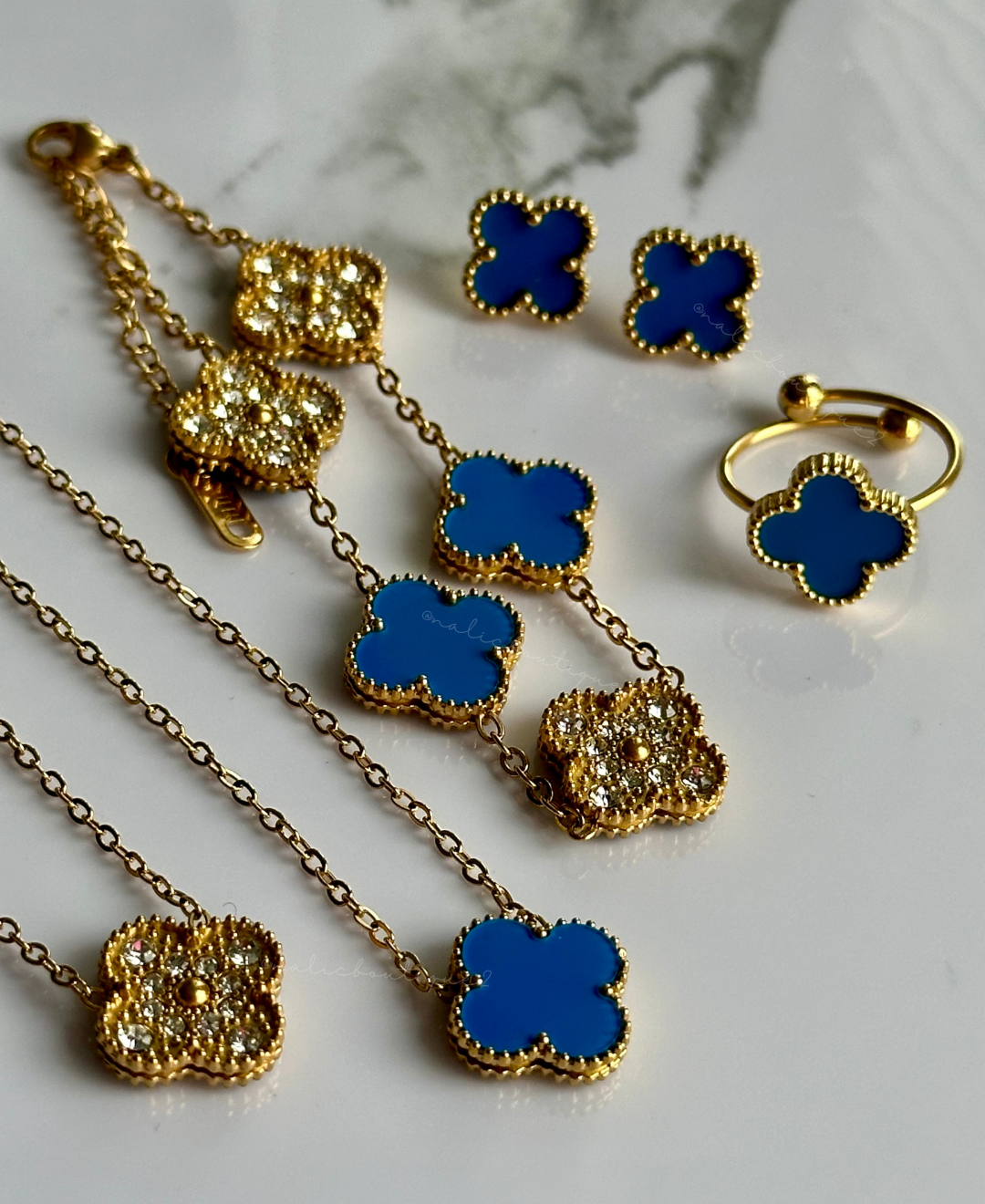 Set trébol azul y oro reversible en SS - 4 piezas